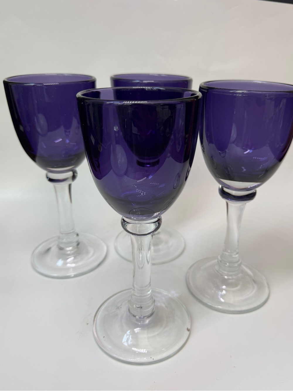 Set of 4 Crate and Barrel Verona heavy footed glasses purple 8”